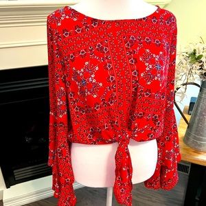 Alter’d state long sleeve blouse with flow sleeves. And tie up front.Size medium